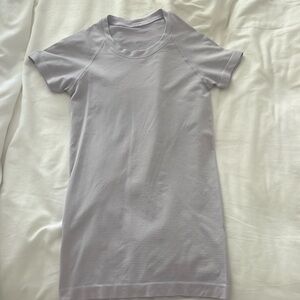 Athletic top, almost brand new, slight scuff mark on back(not noticeable)